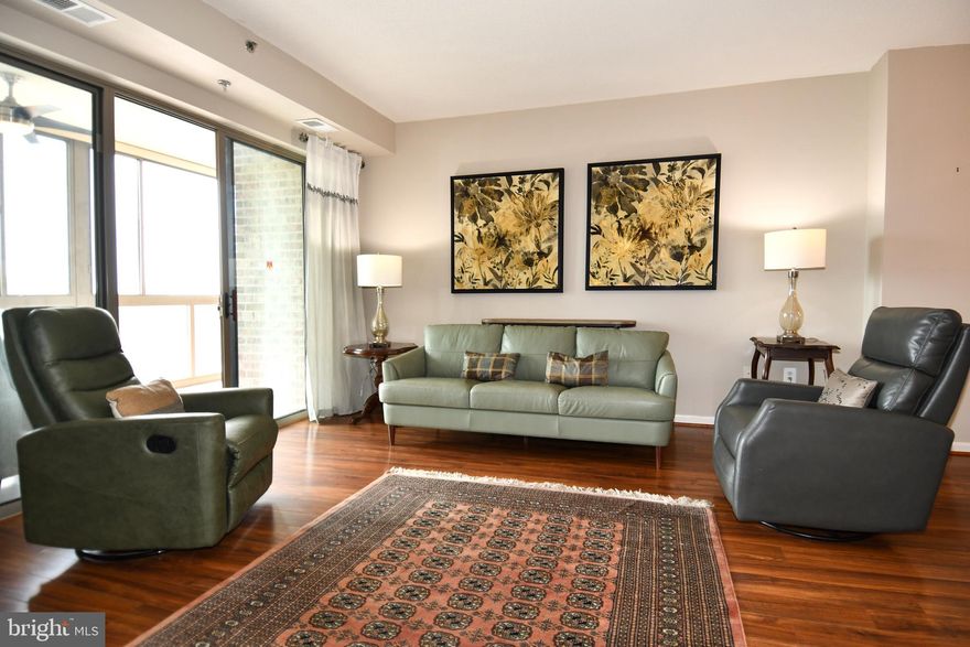 55 and over gated community of Leisure World.  This is a beautiful condo with an open floorplan in an awesome building.  New Heating and Air Conditioning system.  Stainless steel appliances.  Granite counters.  Wood/LVP/Tile floors.  Close to the elevator.  EE Model. Nice View!