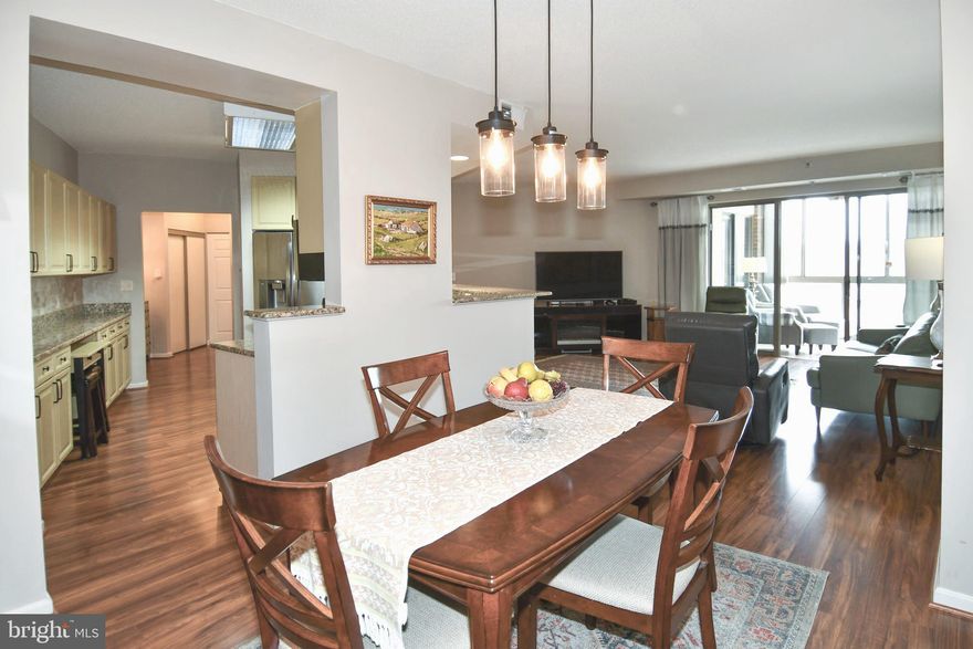 55 and over gated community of Leisure World.  This is a beautiful condo with an open floorplan in an awesome building.  New Heating and Air Conditioning system.  Stainless steel appliances.  Granite counters.  Wood/LVP/Tile floors.  Close to the elevator.  EE Model. Nice View!