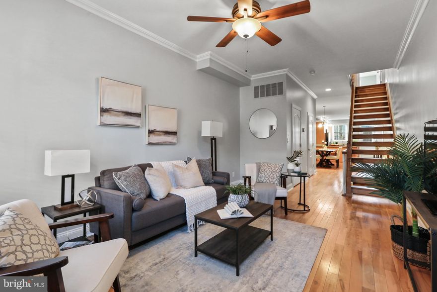 Gorgeous 4 level completely renovated home in Locust Point! Entry level with open floor plan, crown molding, gourmet kitchen with island, granite counters and stainless steel appliances. Laundry, two bedrooms with walk-in closets and two full baths on the second floor. Third bedroom with full bath and walk-in closet on upper level. Huge roof top deck with amazing views and new roof. Lower level features a large finished area that can used as a fourth bedroom and/or family and another full bath.