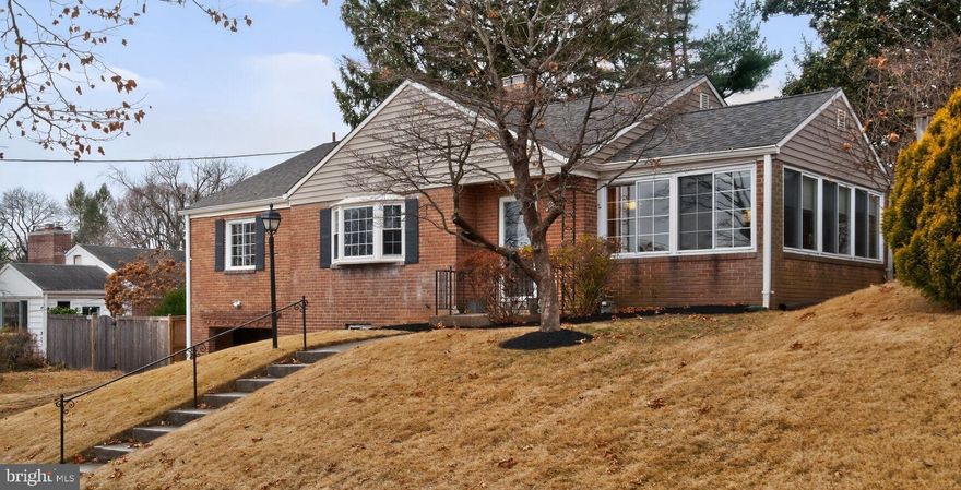 Ranch-style home located in the Parkwood neighborhood of Kensington. The main level features a living room with hardwood floors and a fireplace, a formal dining room with hardwood floors, an inviting foyer, and a spacious kitchen with an island and skylights. A sunroom is located just off the kitchen. The main level also includes a primary suite with a private bathroom, three additional bedrooms, and two additional full bathrooms. The lower level offers a family room with a fireplace, laundry room, utility room, half bath, and a one-car garage. Additional highlights include a rear addition and a rear deck. Recent updates include a new roof, HVAC replacement, refinished hardwood floors, upgraded electrical receptacles, fresh interior paint, and new carpeting.