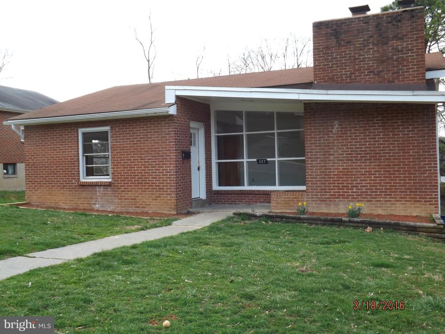 PRICE REDUCED! Tired of renting? Take a look at this "all brick" ranch style home offering one level living! 3 BR, 1 BA offering ceramic tile, hardwood floors throughout, spacious living room with fireplace, large back yard, and full unfinished basement. Great location for downtown amenities, close to parks and shopping! Perfect for first time home buyers or investors. Age of house is an estimate.