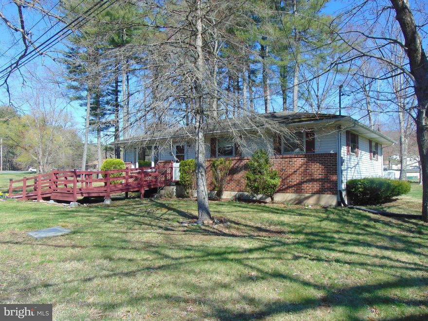 Welcome home.  This nicely kept ranch style home offers a 27 handle kitchen which is open to the dining area.  The dining area has sliders to the covered deck overlooking the private backyard.  The living room is loaded with natural light & offers a propane fireplace for those cold evenings.  3 bedrooms & a full tile bath complete the main living area.  Full basement with laundry area & exterior entrance.  Use your imagination to complete this the area for additional living space & storage.  Spacious backyard to enjoy outdoor entertainment.  Off street parking.  Situated on a spacious lot, just on the edge of town.  Just minutes to I-81 & 78.  Make this home your own, with just a few updates.