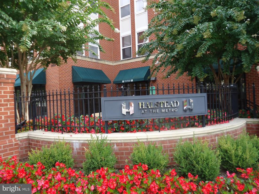 TOP FLOOR OVERLOOKING THE POOL, Balcony.Across the street/walking distance to Dunn Loring Metro, Harris Teeter, shops, and restaurants. Great Location! Minutes to 495, 50, Tysons Corner, Fairfax Hospital, and Metro to Arlington and DC. Leave your car at home!                                                                       One bedroom and one full bathroom at top-level/4th floor. Granite kitchen countertop w/SS Appliances, Gas Fireplace, from Balcony --overlook the outdoor swimming pool. In unit-washer an dryer. One car garage space G4-037. 24-Hour Concierge, basketball court, party room, meeting room, computer room, and outdoor swimming pool. Freshly painted, new neutral berber carpet  installed, A beauty!         This is a "1031" tax exchange. Listing agent is owner.