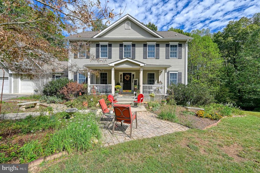 **New and Improved Price** Located on the public side of Lake Anna, this property sits within one of the area’s most desirable gated communities, known for its authentic “lake feel.” Residents and visitors alike rave about the neighborhood’s charm and the perfect balance of relaxation and recreation it provides.

This beautiful country-inspired home features four spacious bedrooms and two and a half bathrooms with a timeless traditional layout designed for comfort and function. The exterior of the home is lush with gardens and plant life offering a scenic Spring, Summer and Fall. As you step inside, a welcoming foyer greets you with a bedroom to the right and a formal dining room to the left. 

The main living room is generously sized and flows seamlessly into the dining and kitchen area, creating the perfect space for both everyday living and entertaining. Just off the living room, you’ll find a private office and a bright bonus sunroom with gorgeous built in shelving, offering year-round enjoyment. From the dining area, step out onto the back deck and enjoy views of the trees and backyard, where the soft sound of a creek can sometimes be heard below.

Upstairs, the home offers a functional layout with two bedrooms and a full bathroom, along with the spacious primary suite and its attached private bath. Each room is filled with character and provides plenty of space to relax and unwind.

With its generous layout, this basement is a blank canvas ready for your vision—whether you dream of creating a stylish rec room, a private home theater, a fitness studio, or even a guest suite. The finished square footage provides an excellent starting point, while the unfinished section gives you flexibility to design the space exactly how you want it. There are rough ins for plumbing for a bathroom and wet bar! 

Short-term rentals are allowed, high-speed internet is available, and the home is conveniently located near Food Lion, restaurants, and other everyday amenities. Boat slips are available for use through the HOA. This is your chance to own a home that blends classic style, modern convenience, and the unmatched lifestyle of Lake Anna. Don’t miss the opportunity to make it yours. ***WATCH THE VIDEO TOUR*** SELLER IS MOTIVATED!