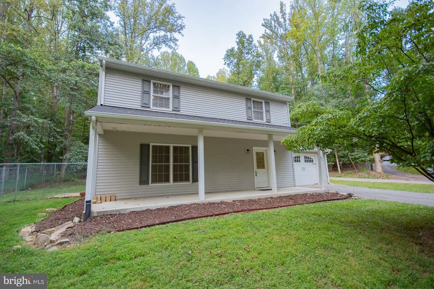 Peaceful Mountain Getaway in Shannondale. Nestled in the desirable Shannondale subdivision of Jefferson County, WV, this charming colonial offers 3 bedrooms, 2.5 baths, and nearly 1,800 sq. ft. of finished living space. Enjoy stunning winter views that stretch as far as Virginia, all from the comfort of your mountain retreat. The home features a whole-house gas generator, a heat pump, and a 500-gallon buried gas tank that conveys. Recent updates include a new roof and water heater (2023), plus fresh paint and new carpet throughout most of the home. The partially fenced backyard and storage shed add space for additional storage.  The community’s  55 acre lake with 25 acre shoreline for year round enjoyment and a small beach provides the perfect place to relax and unwind after dining on refreshments at the Lakeside Bar and Grill. Just a short commute to Virginia and DC, this property is ideal for those seeking a quiet escape without sacrificing accessibility.