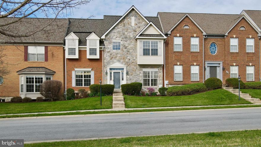 A tremendous opportunity to acquire this beautiful modern home in the popular gated community of Beallair, Charles Town, Jefferson County. A new roof was just completed in late February, 2026! This contemporary home features a primary bedroom suite on the main level! Flooded with natural light dispersing through the large foyer window - the high ceilings give this well-maintained home a spacious and airy feel throughout. The total finished sqft (just shy of 4,500) is comparable to, and in many instances larger than, single family homes in the neighborhood and allows for endless possibilities. Upon entering the homes’ foyer with a 20ft ceiling, you will be met with the first of three family rooms and formal dining room with beautiful hardwood floors. Moving through to the kitchen and family room (2), you’ll discover a warm, welcoming open plan area of the home boasting the popular combination of white kitchen cabinets, gleaming granite countertops and stainless steel appliances. Cabinet storage options and countertop space is plentiful in this spacious kitchen! The main level of the home is expansive and includes the primary suite with an elegant tray ceiling, large walk-in closet and bathroom with dual vanity and soaking tub. The kitchen gives access to the convenient laundry/utility room and entrance to the 2 car garage. The upper level of the home benefits from 2 additional, bright and airy bedrooms with lovely windows that overlook the pretty, tranquil common area opposite the home. Bedroom 3 has a bonus – a huge walk-in closet! There is a linen closet on the upper level and a full family bathroom. As you explore the lower level of the home you may imagine all the possibilities for which the space allows. You will be greeted with a third family room and recreation room, the fourth bedroom, full bathroom and a bright spacious office or fifth bedroom if you prefer! The aerial photography shows off the brand new roof as well as the common area to the front of the home which is just starting to bloom - and it looks beautiful already! More features of the home include a Generac generator and a water filtration system. As Charles Town continues to become more popular with families and commuters alike, a townhouse within this newer community and with this much finished sqft of accommodation will make for a lovely family home and future investment. Bring a picnic to enjoy in the picturesque common area and take a moment to imagine how it might feel to live in the community. The home owners association takes care of snow removal, trash collection, walking trails and lawn/common area maintenance. Enjoy your tour!