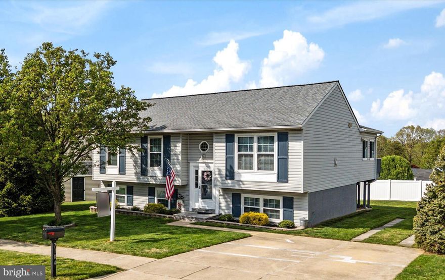 PROPERTY BACK ACTIVE!   Attention to detail is evident throughout this meticulously maintained home with sunroom addition in sidewalk lined streets of Garland,  Renovated kitchen with upgraded white cabinets, shiplap back wall, granite countertop, stainless steel appliances (Refrigerator & Dishwasher replaced 2025) and eat in area that opens to 20x12 sunroom, Generous size living room, Primary Bedroom with private bath and second bedroom that was combined from third bedroom (and could easily be converted back for those needing 3 upper level bedrooms, Lower level with family room,  bedroom, a 3rd full bath and utility room, Come grill, dine or relax on the composite deck overlooking nice-sized back yard with shed, Whole house fan for days you prefer to turn off the central air and open the windows & let the breeze in, Three full baths have been remodeled, Roof, HVAC, Windows and appliances have all been replaced within last 11 years, You'll love the convenience this home offers with access to major thoroughfares for easy commutes to Baltimore, Annapolis, DC, BWI, Amtrack, Light Rail, Fort Meade, NSA & Northrop Grumman plus desired services and amenities,