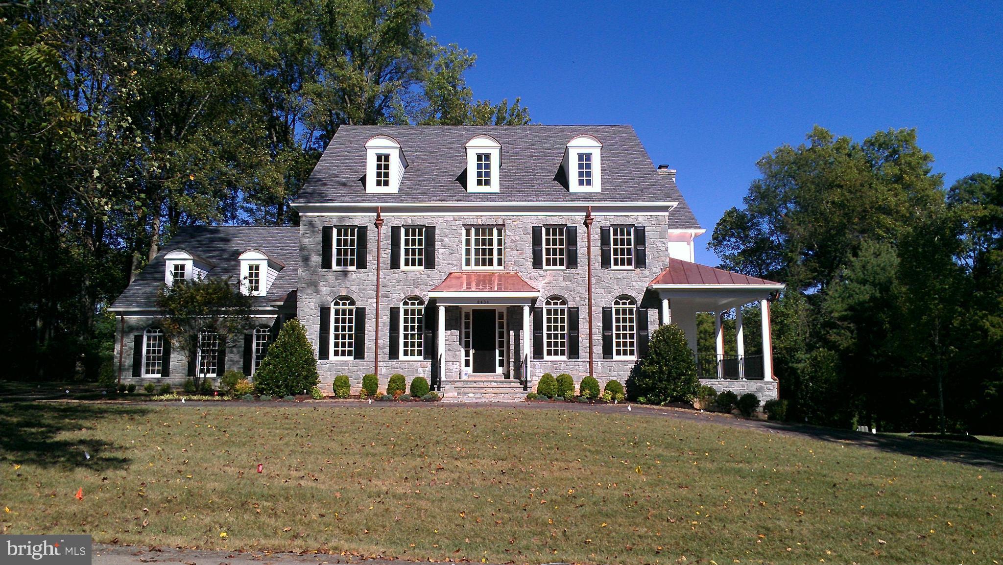 **HURRY**ACT FAST** because this home won't last! Gorgeous Colonial Home in the most sought after area in McLean. Walk to Tysons Corner easy access to Rte. 66 & 495. MUST SEE INSIDE this gorgeous 6 bedroom/ 8 bathroom 9100 Sq. Ft. home. BRAND NEW CUSTOM BUILT TO SUIT any lifestyle. 10ft Beamed Ceilings, Wood trimmed walls, Custom Tile Work,Built in Book Cases,Towering 8ft Solid Core Fr. Doors...