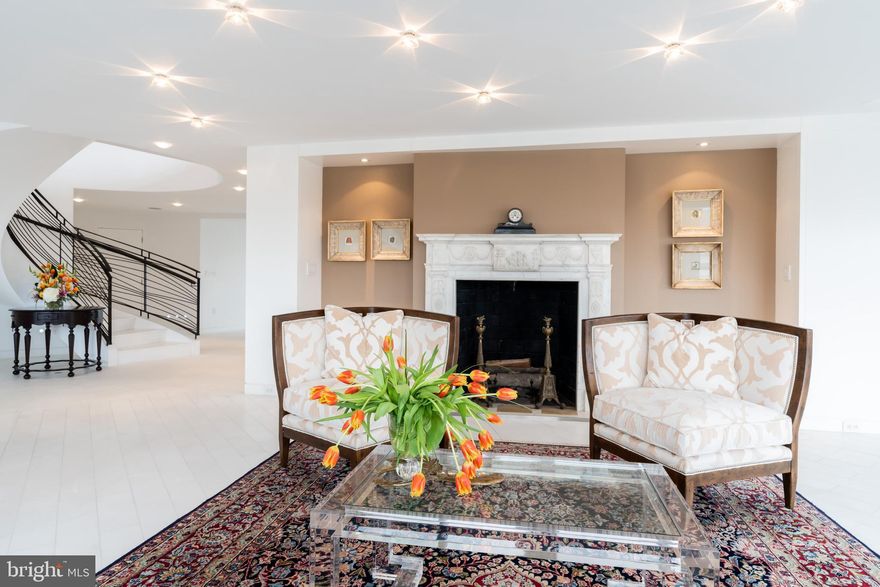 NEW PRICE: The best view in a  Best Address co-op! This Watergate penthouse defines DC's luxury living and design. Possibly the finest renovation ever offered within the iconic Watergate Cooperative. The design capitalizes on the panoramic views of Washington, DC with 270-degree views of the city. The private rooftop terrace graciously wraps around the Watergate co-op offering the new owner's postcard views of Memorial Bridge, Potomac River, Lincoln Memorial, Washington Monument, the Capitol dome, and the spires of Georgetown and the National Cathedral. This stunning home spans 4,640 sq./ft. of indoor living space and 1,500 sq./ft. of additional interior space on the private rooftop space. The rare expanse of open living space on both levels provides opportunities for multiple home/office/study areas with large gathering spaces and a generously sized kitchen for family times and personal enjoyment. The apartment was designed and completely renovated by the award-winning Cunningham and Quill Architects of Washington, DC. The design offers an open floor plan that follows the curve of the monumental core of the city and the uniquely mid-modern Watergate. The designers selected a palette of marble and granite stone, metal, and exotic wood to detail the space, capturing the panoramic views to create a harmonious sun-lit setting in every room. The bronzed patina steel staircase rail, custom-designed to connect the two main salons with the upper rooftop terrace pavilion, frames the original crystal chandelier. New insulated windows, electrical, and HVAC were installed during the renovation. The pavilion structure was thoroughly reconstructed with a new roof, sliding glass doors, irrigation for plantings, and a powder room. The outside terrace was newly planted with a low-water green roof garden. Stone planters filled with colorful seasonal flowers and tree boxes are strategically placed to enhance privacy. The whole house audio system, with nine zones, includes in-wall, ceiling, and outside waterproof speakers, managed with a smartphone, tablet, or remote control. The entertainment and whole-house sound system convey to the new owner. This beautiful residence is a true entertainers paradise. It is currently on the market and available to show by appointment through the listing agent.