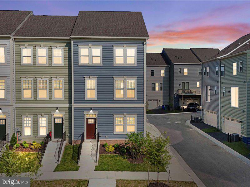 Nearly New End-Unit Townhome – Move-In Ready, Priced to Sell!
Why wait for new construction when you can have it all now? This stunning end-unit 3-level townhome is less than a year old and ready for immediate move-in. Located in a prime location close to shopping, dining, and major commuter routes, it sits in a vibrant new neighborhood!
As an end unit, this home is filled with natural light, creating a bright and inviting atmosphere on every level. The open-concept layout features a stylish kitchen with a large island, elegant quartz countertops, modern backsplash, and ample cabinet space—perfect for entertaining or everyday living.
Enjoy the convenience of an attached garage for easy parking and extra storage, plus additional driveway space. With three beautifully finished levels, this home offers the perfect blend of comfort, space, and contemporary design.
Don’t miss this opportunity to own a move-in ready home in a growing community—with no construction wait. Schedule your private tour today!