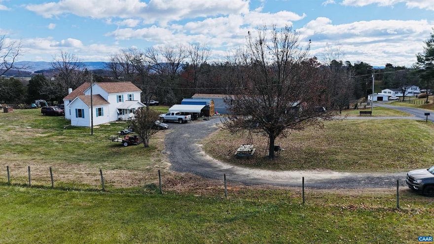Welcome home to 43 Niswander Rd!  Experience the charm of country living on nearly 5 acres of beautiful farmland. Enjoy the peace and fresh air of the countryside while staying just minutes from the conveniences of town-including the hospital, shopping, restaurants, and easy access to Staunton, Waynesboro, and the interstate.  This lovingly updated farmhouse blends timeless character with modern comfort. Over the years, thoughtful additions have enhanced the home while preserving its old-world charm. The recently renovated kitchen features brand new cabinetry, butcher block countertops, and all-new appliances. Fresh paint, updated flooring, adding a secondary 200 amp electric panel, plumbing, and a new roof mean there's nothing left to do but move in and start enjoying your new home.  Outside, you'll find a second dwelling (single wide trailer) that shares the septic and well-perfect for guests, family or rental potential. A peaceful pond with ducks, multiple outbuildings, and partially fenced pastures make this an ideal setting for horses or other farm animals.  Take in the lovely mountain views from your rocking-chair front porch.,White Cabinets