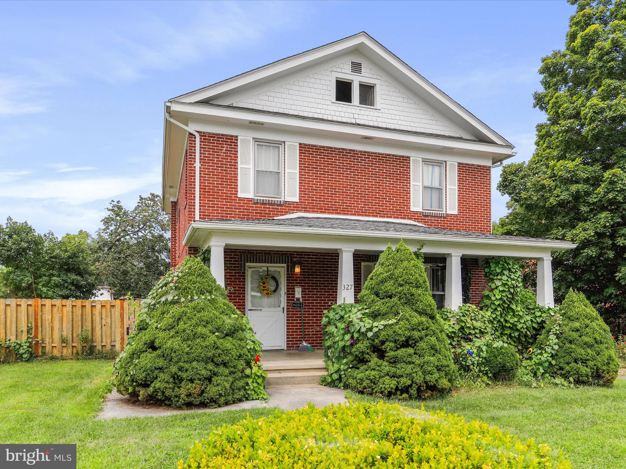 Come and see this charming craftsman home in downtown Romney! This solid brick home offers ample space with its four bedrooms and large kitchen. A dining room sits right off of the kitchen which is ideal for dinners and entertaining guests. The living room is a nice size for relaxing. The covered front porch is a bonus of the exterior space along with the fenced in backyard. The location of the home is within walking distance of Main Street. The driveway and garage boast off street parking and storage area. This lovely home is a must see!