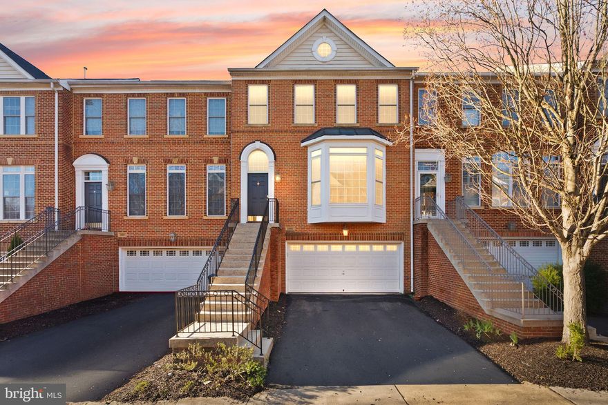 Thoughtfully renovated throughout, this Oakton home offers a rare blend of elevated finishes, functional layout, and everyday livability across three beautifully updated levels.

The heart of the home is the reimagined kitchen, anchored by a large center island with seating and storage, complemented by brass hardware, a gas range, classic subway backsplash, and a generous pantry cabinet. The adjoining dining area is centered around a gas fireplace, creating a natural gathering space, while a light-filled morning room extends the living area and opens directly to the deck. Adjacent to these spaces, a spacious and sun-filled family room features hardwood floors and a bay window, all connected by a welcoming foyer that ties the main level together with both function and flow.

Upstairs, vaulted ceilings enhance all three bedrooms, including a spacious primary suite tucked privately at the rear of the home. The suite features a cozy reading nook, two walk-in closets, and a beautifully renovated bath with dual vanities, designer tile selections, a corner soaking tub, separate shower, and water closet. Laundry is conveniently located on the upper level.

Renovated bathrooms throughout reflect a cohesive, design-forward approach, while upgraded lighting, custom window treatments, and two gas fireplaces add warmth and continuity across the home.

The fully above-grade walkout lower level offers exceptional flexibility with a large recreation space and an ideal area for a home office, gym, or playroom. The property also features a fenced backyard, two-car garage, spacious driveway -- all desirable features for easy everyday living.

Ideally positioned for both convenience and connection, the home is just 1.4 miles to the Vienna Metro and near 66 access, making commuting seamless. Enjoy close proximity to downtown Vienna, downtown Fairfax, and Mosaic District for dining, shopping, and everyday essentials. Located within the highly regarded Oakton High School pyramid—offering the ideal balance of accessibility, lifestyle, and top-tier schools.