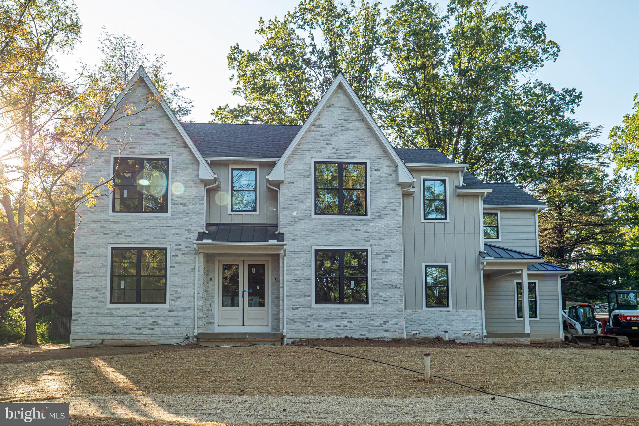 In the market for a luxury new construction home with a quick fall move-in? Step into luxury and experience the perfect blend of classic elegance and modern design in this exquisite new construction custom home built by renowned local builder Zappitelli Homes. Nestled on a private 1-acre lot in the highly sought-after Tredyffrin/Easttown School District, this architectural gem showcases timeless European influence paired with contemporary sophistication. Spanning over 5,900 square feet, this custom masterpiece delivers an unmatched combination of thoughtful design, luxury finishes, and an unbeatable location. With 5 bedrooms, 5.5 bathrooms, an oversized 3-car garage, and a fully finished lower level, every inch of this home has been meticulously crafted for luxury living and effortless comfort. From the moment you step inside, you’ll be captivated by the high 10' ceilings, sunlit spaces, and the seamless flow of thoughtfully designed rooms. At the heart of the home, a chef-inspired kitchen impresses with top-of-the-line Thermador appliances, custom cabinetry, quartz countertops, a large center island, and a built-in banquet for casual dining. A custom stove grotto, coffee bar, and great room bar elevate everyday moments and entertaining alike. Tucked just behind the kitchen is a fully outfitted scullery and walk-in pantry—complete with its own refrigerator, sink, dishwasher, and a convenient Costco door to the garage—offering the ultimate in function and luxury. Upstairs, retreat to the serene primary suite featuring a spa-style bath with a freestanding soaking tub, dual vanities, a large walk-in shower, and a generous custom closet. The second level also includes a guest suite with a private bath, a princess suite with its own ensuite, and two additional bedrooms joined by a beautifully appointed Jack-and-Jill bath. The finished lower level adds even more flexibility with space for a gym, media room, home office, and a full bathroom—perfect for guests or quiet escapes. Located in a quiet, sought-after neighborhood, this exceptional property is just minutes from top-rated Main Line dining, fitness centers, shopping, and major commuter routes. This is more than a home—it’s a custom-designed lifestyle crafted for those who expect the very best. Early Fall 2025 Settlement!