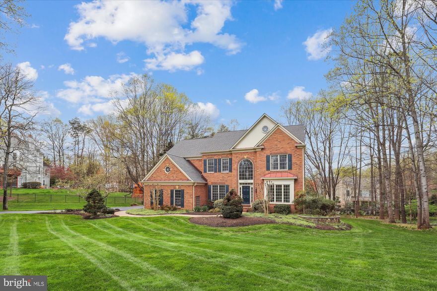 Up-to-the-minute style in this tastefully updated and impeccably maintained home in sought after Wheatland Farms.  Offering roughly 6,000 square feet of light-infused space on a gracious .86 acre leafy lot with a deep, lush green front lawn.  No detail has been overlooked by these meticulous owners.  5 bedrooms and 4.5 baths to suit your lifestyle in this Pulte Hampton II model.  The kitchen was updated in 2018 and offers stainless steel appliances, including a 6-burner Wolf gas cooktop, a convenient beverage center with wine refrigerator, drawer storage, and glass-front cabinets with interior lights, a walk-in pantry with custom shelving, and abundant kitchen cabinetry. Access the garage via a short hallway off the kitchen. This hallway features a large, double door coat closet and access to a spacious laundry room.  Just off the kitchen sits an awe-inspiring two-story family room with a warm gas brick fireplace framed in stunning molding rising to the ceiling.  Astride the two-story entrance foyer are the formal living and dining rooms, both generously sized and elegantly appointed.  The main level also conveniently houses a home office with classic built-ins and a gracious bay window overlooking the backyard.  Off the kitchen and the family room sits a wonderful no-maintenance screened porch, beckoning you to outdoor dining and entertaining in this perfect spring weather.  Upstairs,  four spacious bedrooms.  Two of the auxiliary bedrooms share an updated "buddy" bath, and the other has its own renovated private bath.  The primary suite is truly breathtaking, an enormous bedroom with a seating area warmed by a gas fireplace and built-in bookshelves.  The suite also offers a state-of-the-art renovated bath, with a large steam shower sheathed in seamless glass, a jetted tub and separate vanities.  The huge walk-in closet is professionally organized.  On the lower level, a huge above ground living area, with plenty of natural light, for a recreation room as well as a game room.  Here, you also find a large 5th bedroom with direct access to another renovated full bath.  The lower level walks out to a stone patio and a beautifully manicured rear yard. Recent updates include roof, gutters, dishwasher, refrigerator, and septic tank pump replaced in 2022.  The community of Wheatland Farms is perfectly located, for commuting, for shopping, and just for gracious living.  These homes do not become available often.  The community is bucolic and threaded with county parkland.  Fairfax County schools are Waples Mill Elementary, Franklin Middle and Oakton High School.