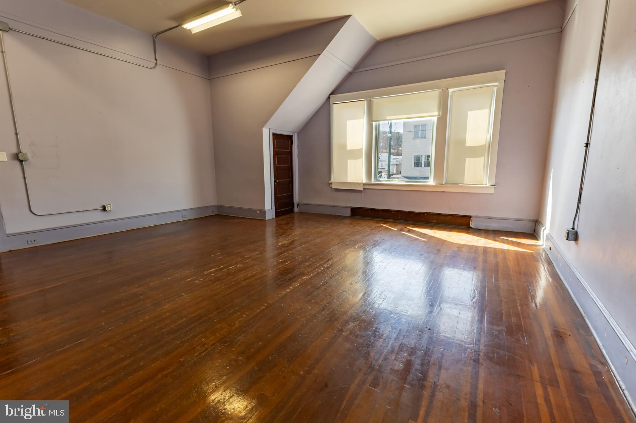 Looking to have an office space, art gallery, daycare, photography studio, etc on 2nd street in Saint Clair? Look no further. This commercial space, with lots of off street parking, is perfect for a brand new or expanding business! The beautifully hardwood floored space, is perfect for SO many business! Or open the antique double rolling doors and turn the medium rental space into the whole second floor. With large windows and a storage space, this unit is perfect for so many ideas! Call for a tour today!
Photos by Michala Reber Photography