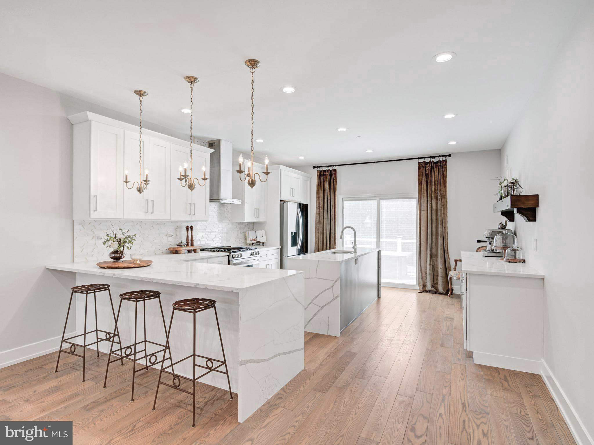 Welcome to this beautiful 2800 sqft, nearly brand-new townhome with 9 more years of Tax Abetment, in the heart of Bridesburg, one of Philadelphia’s most peaceful and convenient neighborhoods. Just a year old, this spacious 3-bedroom, 3-bath home features a bright, modern layout with clean lines and quality finishes throughout. The open-concept main level includes a sleek kitchen that flows into the dining and living areas, with sliding doors that lead to a private deck—perfect for morning coffee or evening gatherings.
Downstairs, a large finished walk-out basement offers flexible space for a family room, home gym, or office, with direct access to the fenced backyard. Upstairs, you’ll find three well-sized bedrooms and two full baths, including a quiet primary suite retreat. An attached garage, driveway parking, and thoughtful design details make everyday living easy and comfortable.
Situated on a quiet residential street, yet just minutes from I-95, shopping, dining, and more—this home truly offers the best of both worlds. Move right in and enjoy modern city living with a neighborhood feel.