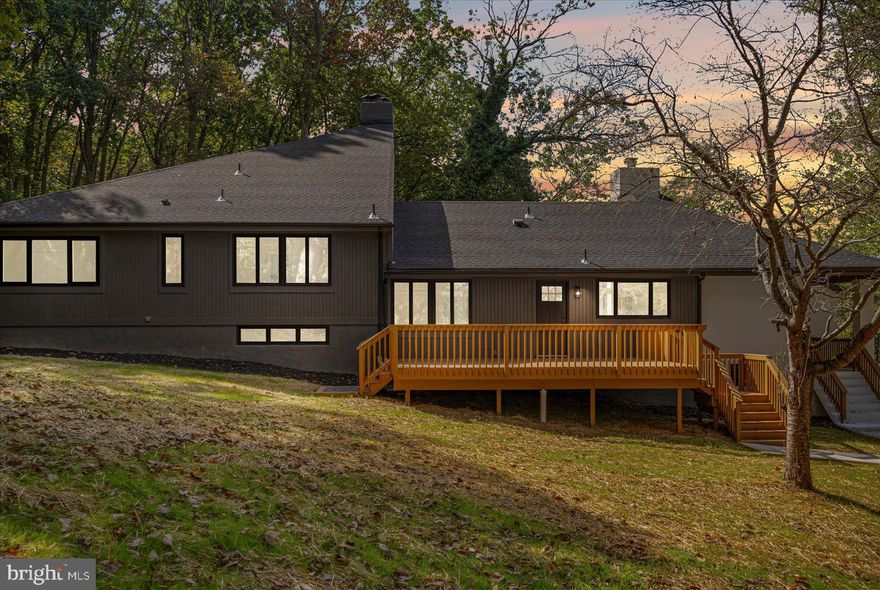 Experience contemporary luxury in this fully renovated home, perfectly set on over 10 acres of serene countryside. Soaring ceilings and walls of windows fill the interiors with natural light, creating an airy, open atmosphere throughout. The great room is anchored by a striking stone fireplace, one of several fireplaces that lend warmth and character to the home.
The gourmet kitchen boasts sleek quartz countertops, high-end finishes, and generous space for both cooking and entertaining. A dramatic spiral staircase leads to a loft area, ideal for a private retreat, home office, or creative space. Every detail has been thoughtfully updated, blending modern design with timeless comfort.
This is more than a home—it’s a statement of style and sophistication, offering both privacy and elegance in an idyllic natural setting.