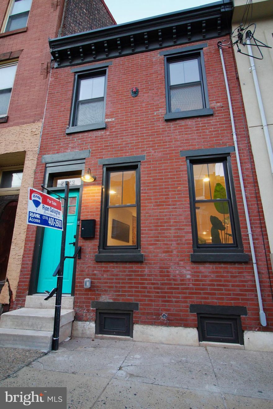 Completely renovated from head to toe in Fishtown! This 3 bedroom, 2 full + 2 half bath house has hardwood floors t/o, recessed lighting, exposed brick, new sheetrock, trim + paint, new windows, ceiling fans, doors, fixtures, gas fireplace, Smart Hvac system. New kitchen with granite counters, 42 inch white cabinets, + stainless steel package. 2nd floor has 3 bedrooms.  Master bedroom  has it's own full bath + loads of closets.  Finished basement w/ another half bath + mechanical room. New 100amp service, central air + heat and plumbing. Nest Thermostat, Ring Doorbell, multiple skylights, stairs w/ custom rails + rear alley access. Everything has been completed for you. Located on a great block, in the heart of real Fishtown, stroll to numerous restaurants, cafes + bars. Close to Septa, I-95, + Center City.