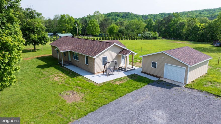 TOTALLY REMODELED......Beautifully finished with an open floor plan that flows nicely between kitchen, the dining area and living room. Hardwood floors grace most of the 1400 square foot of living space. The kitchen, dining room and baths all feature durable commercial grade vinyl plank flooring. With all new Low-E windows, new doors and new insulation, this home will heat and cool very efficiently with the new HVAC system will provide year-round comfort.  This home is ready for immediate move-in, with no maintenance or upgrade needed for many, many years.  The exterior has been sided with durable, low maintenance LP board. This lovely rancher has 5 sprawling acres that is well suited for a small farm.  The post for the fencing has already been installed for you to keep at that right price, just add the rest and it can become your equine paradise or a home to whatever animal you will enjoy. Additional photos coming..