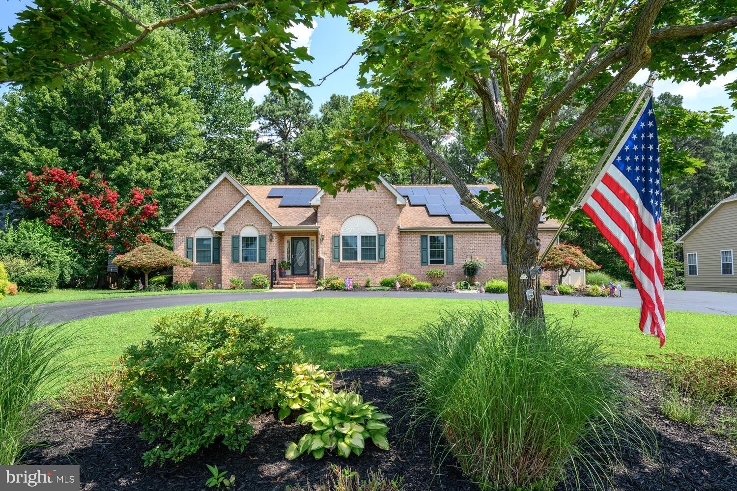 Welcome to 251 Devon Drive located in the desirable Coventry Farms neighborhood. When entering the paved circular driveway, you will find the property meticulously landscaped. The inviting curb appeal welcomes you into the home's foyer where you will find a living room to the left and formal dining room to the right. The foyer then leads you into a spacious kitchen that features a peninsula island with a breakfast bar and cabinetry that offers ample storage and workspace including a separate pantry. Off from the kitchen is a room overlooking the back yard that offers access to the back yard. The primary suite is privately located in rear of home being complete with shower stall, tub, large vanity as well as a linen closet. The two additional bedrooms are located on the opposite wing of home offering separation. The finished basement is quite a highlight with a six-foot glass walk-out door onto the large rear private patio that overlooks an open wooded area that features mature trees, flowering shrubs and perennials. The pleasure of seeing deer and wild turkey stroll through and the morning sound of birds offers a peaceful retreat. Now to come back inside the basement, you will find it amazing. The main room coming in is very large being open to a kitchenette. The large room having a gas fireplace is presently used as a game room. The game room opens to a sitting room with half-bath access. There are additional rooms in the basement that includes a large workshop and another sizable room that could be used as a theatre room, work-out room or for whatever the need may be. The stairs from the basement up into the main level includes a chair lift. The home has a generator and solar panels for energy efficiency, as well as a yard sprinkler system and soaker hoses to keep the landscaping looking its best. This home being located in the historic town of Chestertown offers convenience to the Chester River, cultural festivities, waterfront parks, rail-trail, The Farmers Market, YMCA, hospital, shops and Washington College. The public record reflects the main level being 2135 SF with the lower level being 1800 S.F.