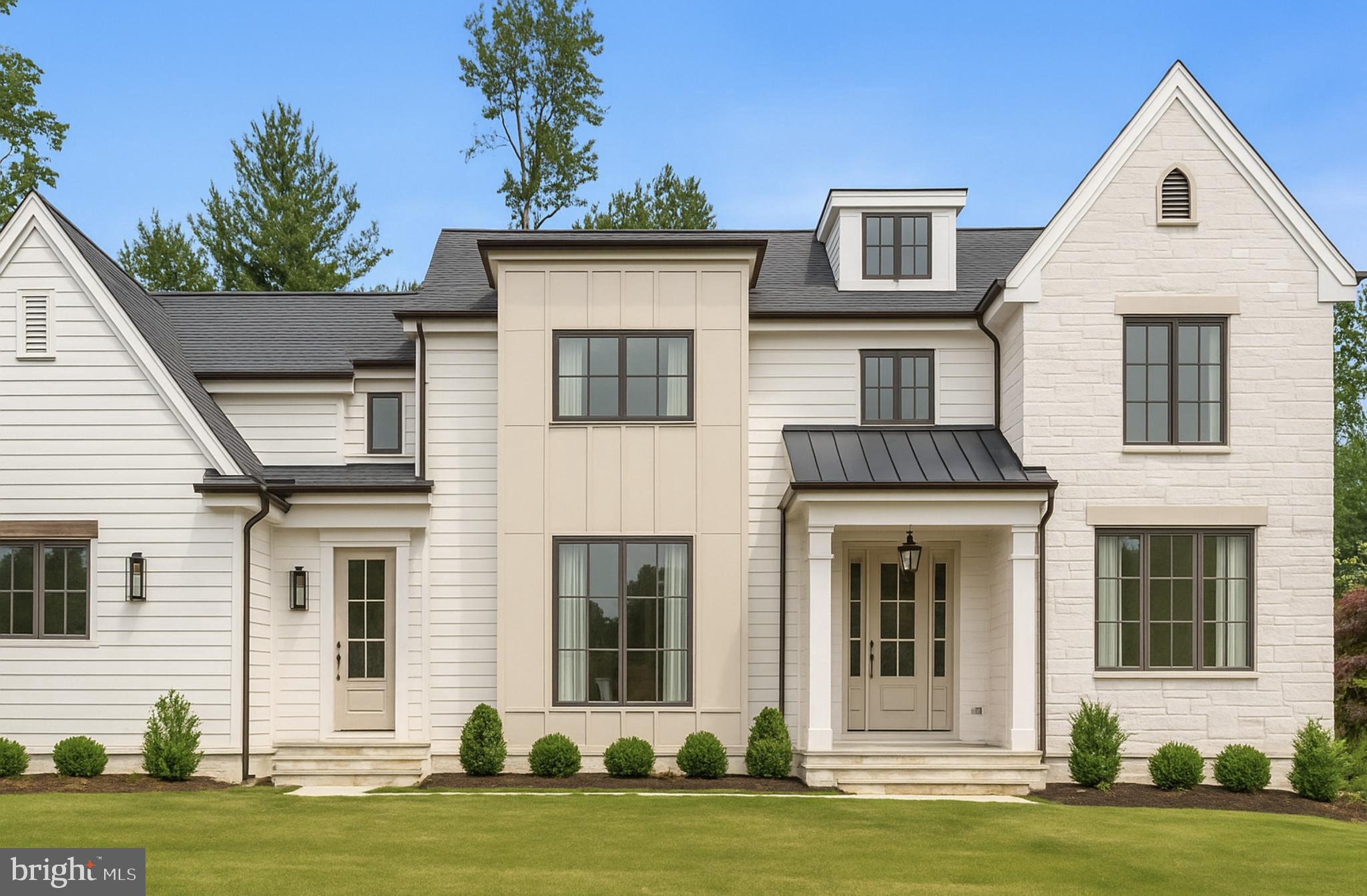 Tucked away on a quiet cul-de-sac in sought-after Bryn Mawr, this exceptional new construction home offers over 6,000 square feet of thoughtfully designed living space in the award-winning Lower Merion School District. Featuring 5 spacious bedrooms, 3 full bathrooms, and 3 half bathrooms, this home blends classic elegance with modern amenities throughout. A dramatic two-story foyer with sightlines to the backyard welcomes you into the house, setting the tone for the light-filled, open floor plan layout. Gorgeous wide-width hardwood floors flow throughout the main level. The formal living room connects seamlessly to a private home office and a convenient powder room. Entertain with ease in the elegant formal dining room adorned with custom wainscoting, served by a butler’s pantry. The heart of the home is a chef’s dream kitchen featuring crisp white wood cabinetry with gold hardware, gleaming quartzite countertops, high-end appliances, and an oversized center island with seating. A bright breakfast room opens to the inviting family room with a cozy gas fireplace and French doors leading to a spacious back terrace—ideal for indoor-outdoor living. Off the kitchen, you'll find a large walk-in pantry, a well-appointed mudroom, an additional powder room, and access to a 3-car oversized garage. The luxurious primary suite upstairs offers vaulted ceilings, two walk-in closets, a spa-like marble bathroom with dual vanities, a soaking tub, and a large walk-in shower. Four additional bedrooms, two full bathrooms, a convenient second-floor laundry room, and a 4th roughed-in full bathroom, ready to make your own, complete this level. Hop on the 1st floor slide down to the expansive finished lower level offering abundant space for a playroom, gym, or media area, along with a half bathroom and ample storage. Located just minutes from the shops and restaurants of Bryn Mawr, Radnor, and Conshohocken, and with easy access to major roadways, this home offers the perfect combination of space, style, and convenience.