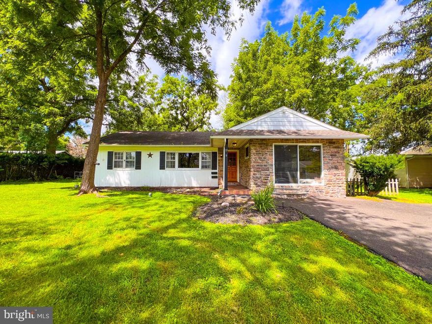 Fantastic opportunity to own a ranch home walking distance to Yardley Boro, the Yardley Train Station, and right across the street from Yardley Country Club. This 3 Bedroom, 2 full bath ranch home sits on a beautiful street and has a gorgeous, deep, .71-acre wooded lot. Hardwood floors are throughout the majority of the home and there is real, rich wood paneling in the great room. The great room also features exposed peg and beam details on the ceiling and a large picture window. The eat-in kitchen has lighter wood cabinets, stainless steel oven and refrigerator, replaced windows and recessed lights. The main bedroom has a pocket door, built ins, a large sliding glass door, and a remodeled en-suite bath with marble ceramic tile floors and surrounds, oversize vanity, and corner shower. 2nd full hall bath has ceramic tile floors and surrounds. Most rooms have deep baseboard molding. All 3 bedrooms have ceiling fans and ample closet space. Many of the windows have been replaced. The oil heater, central air and the hot water tank have all been replaced. The oil tank is above ground and on the side of the home. The dining room could be a 4th BR, or den/study.  The backyard is a wonderful park like setting with a deep wooded lot and 2 large storage sheds.  The lot extends well into the trees in the rear yard.  Low taxes for a single home in Lower Makefield/Yardley in Pennsbury schools. Great home with loads of potential is an estate sale and is being sold "as-is". This home is a short walk from the restaurants and shopping of historic and charming Yardley Boro and the Yardley Train Station. You're also minutes away from I-95, Route 1, the Princeton Corridor and other train stations with NYC destinations. Single home for the price of a townhome. This must see home can accommodate a quick settlement if desired.