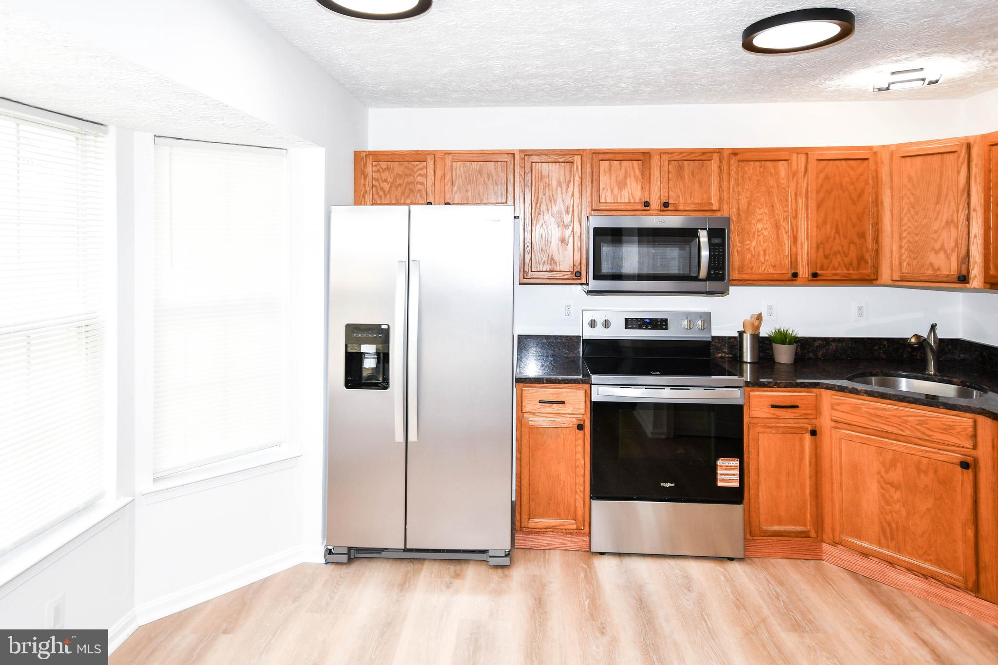 6907 WILDROSE COURT