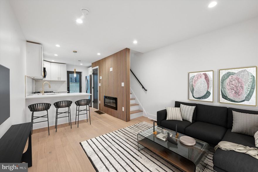 This brand-new, fully renovated home in the heart of Passyunk offers a fantastic location just steps from the famous Pat’s & Geno’s and Passyunk Avenue’s shops, bars, and restaurants. Not to mention the park views directly across the street.! The home features 2 bedrooms, 2 bathrooms, a finished basement, and custom closets in both bedrooms. Enjoy skyline views from every floor, plus a skylight on the third floor that fills the home with natural light. There’s also a private outdoor space and second-floor laundry for convenience. Perfect for modern living in a prime South Philly location! RARE PERK - Outside left wall is rented on a 3 year lease for 1500 a month. ASK ME ABOUT IT !