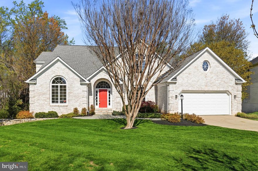 Nestled in the prestigious Village of River Hill, this striking custom home presents a rare opportunity - one that buyers don't often see. Blending elegance and comfort, the home is introduced by a timeless white brick façade, enhanced by professionally designed landscaping, extensive hardscaping, mature trees, and a tranquil, private yard. As you enter, the soaring two-story foyer greets you, leading into a thoughtfully designed floor plan that offers cozy nooks for reading, sunlit corners for your morning coffee, and stylish spaces perfect for entertaining guests.

The main level features newly refinished hardwood floors and fresh paint, all enhanced by captivating views from expansive windows that fill each room with natural light. The family room boasts a soaring 12-foot ceiling and a stunning gas fireplace, creating a warm and inviting atmosphere. Culinary enthusiasts will adore the gourmet kitchen, complete with a spacious center island, luxurious granite countertops, and a charming breakfast room that opens to an oversized screened-in patio, perfect for relaxation and outdoor dining.

An elegant, oversized dining room offers the ideal setting for hosting dinner parties, accommodating family and friends with ease and the living room enhances both comfort and convenience.

Retreat to the sumptuous second primary suite, featuring its own gas fireplace, a lavish private bath with a soaking tub adorned with custom tile, a separate shower, dual vanity sinks with upgraded countertops, and an expansive walk-in closet. The upper level comprises two additional spacious bedrooms, each newly painted, with private full baths and generous walk-in closet space.

The lower level is a true bonus, showcasing a vast recreation room with recessed lighting, 5th bedroom and 5th full bath. A standout bonus, two oversized storage rooms deliver an abundance of space, with one featuring custom built-in shelving to keep everything beautifully organized. The walk out access leads to the private back yard surrounded by nature's beauty, this home offers easy access to scenic pathways, top-tier amenities, and the added luxury of proximity to highly regarded blue ribbon schools. Enjoy the best of Clarksville living, with local parks, upscale shopping, and fine dining just moments away. This home truly has it all—style, space, and a coveted lifestyle in a thriving community!