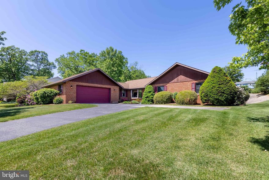 Welcome to this charming brick rancher nestled near the heart of historic Chambersburg, PA, tucked on a cul de sac. Step inside to discover a newly renovated kitchen, boasting quality quartz countertops and soft-close drawers, creating a perfect blend of style and functionality. The layout provides ample room for culinary creativity while enjoying the company of loved ones. Venture outside to explore the beautiful yard, offering many possibilities for outdoor activities and relaxation. Unwind in the tranquility of the enclosed porch, an ideal spot for indulging in a good book or simply basking in the serenity of nature. Once summer passes, and the seasons change, retreat indoors where the woodstove, promising cozy warmth during chilly winter evenings. With a vaulted ceiling in the sitting room and hardwood flooring in the bedrooms, this home combines comfort and elegance to create a haven you'll never want to leave. The full unfinished basement allows you room to expand to suit your needs. Schedule your private showing!