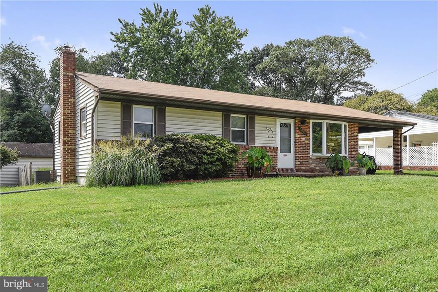 Motivated seller, REDUCED!  Rare opportunity to own this amazing 3 bedroom rancher situated on a large corner lot with a in-law suite in lower level.  A true  Mechanics Delight offering an attached carport and a huge 2 car garage with yes.. a man cave in the back with built in bar, perfect for big game days!  Bright eat in kitchen with lots of counter space and a large living room with Bay Window.