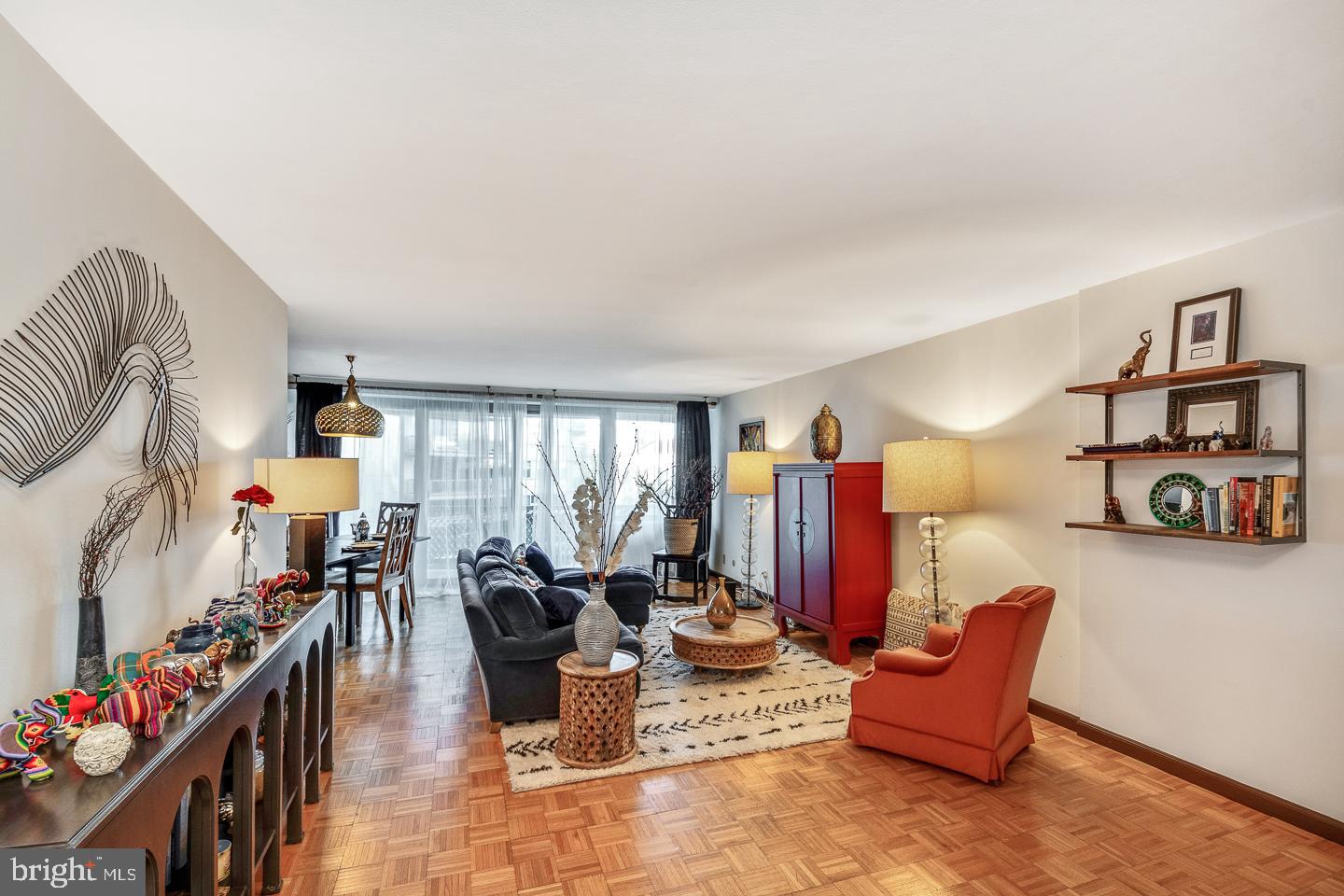 Welcome to the residences at The Philadelphian, Unit B423. This Art Deco Styled building is charming and grand. Literally across the street from the world renown Philadelphia Museum of Art on Benjamin Franklin Parkway, the Art Museum neighborhood is bursting with culture, museums, greenspace and restaurants. Be greeted daily by a 24-hour dedicated doorperson, as you step into the stately lobby with concierge to assist with daily needs. Fitness center, indoor and outdoor pools, as well as a supermarket, restaurant, dry cleaners, laundry center, pharmacy , and free shuttle to center city are all convenient amenities available on site. Key fob only entry adds another level of comfort ascending to the 4th floor to tour the unit in the coveted B tower. This very large one bedroom, one bathroom unit boasts nearly 1200SF of space. Natural hardwood parquet floors, extend throughout. The space feels open and airy with a combined living and dining area, which leads to a private balcony with a North facing view. An outdoor place to have coffee and a breath of fresh air is wonderful. The kitchen has ample cabinet space with a standalone range and a dedicated built-in oven. Closets are large and plentiful, which allows the unit to remain orderly and organized in living areas. The "on trend", vintage postwar pink bathroom is retro fab, with an enigmatic ceramic custom floor tile interspersed with muted green accents. The bedroom is expansive. Wall to wall windows drape the northern extremity and the room can host a king sized bed with no trouble at all. We envision this unit as a fantastic primary residence or pied-Ã -terre for someone who values convenience, security, proximity to arts and culture, or a fitness enthusiast. Imagine walking out the door daily to walk, run or bike along Kelly Drive next to the river past the houses on Boathouse row. Imagine running up the steps like Rocky Balboa everyday looking at the skyline fists raised. Experience the variety of attractions featured at the Barnes Foundation, Rodin Museum, Philadelphia Museum of Art, Eastern State Penitentiary, or Franklin Institute. Find a host of walkable retail and restaurants, and there is a Whole Foods Market right down the street. This is a great unit in a fantastic building! The Philadelphian condo fee cover gas, water and electric as well as basic cable and common area maintenance.