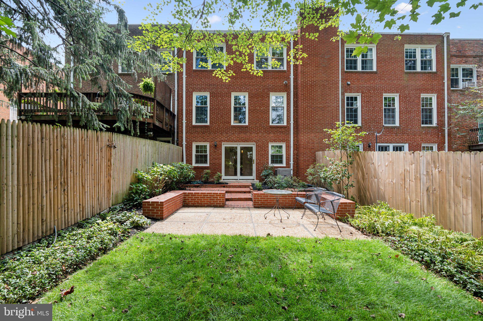 Welcome to this charming all brick townhome nestled at the end of a quiet cul de sac in Falls Church City. Just under a mile to East Falls Church Metro and mere minutes from Cherry Hill Park, the Farmer’s Market and the W&OD trail, this location offers exceptional walkability—earning a Walk Score of 85. Spread across three finished levels, the upper floor features three spacious bedrooms and two full baths, with convenient half baths on both the main and lower levels. Inside, beautiful hardwood flooring flows throughout and two cozy fireplaces add warmth and charm. The gourmet kitchen opens to a light filled living area, while French doors lead from the lower level to a fully fenced backyard boasting a patio and lawn/garden space—ideal for indoor outdoor living and entertaining. With no HOA fees and a desirable urban village setting, this townhome offers a perfect blend of comfort, character, and location. All of this plus Falls Church City schools for those with children. Come see it in person today!