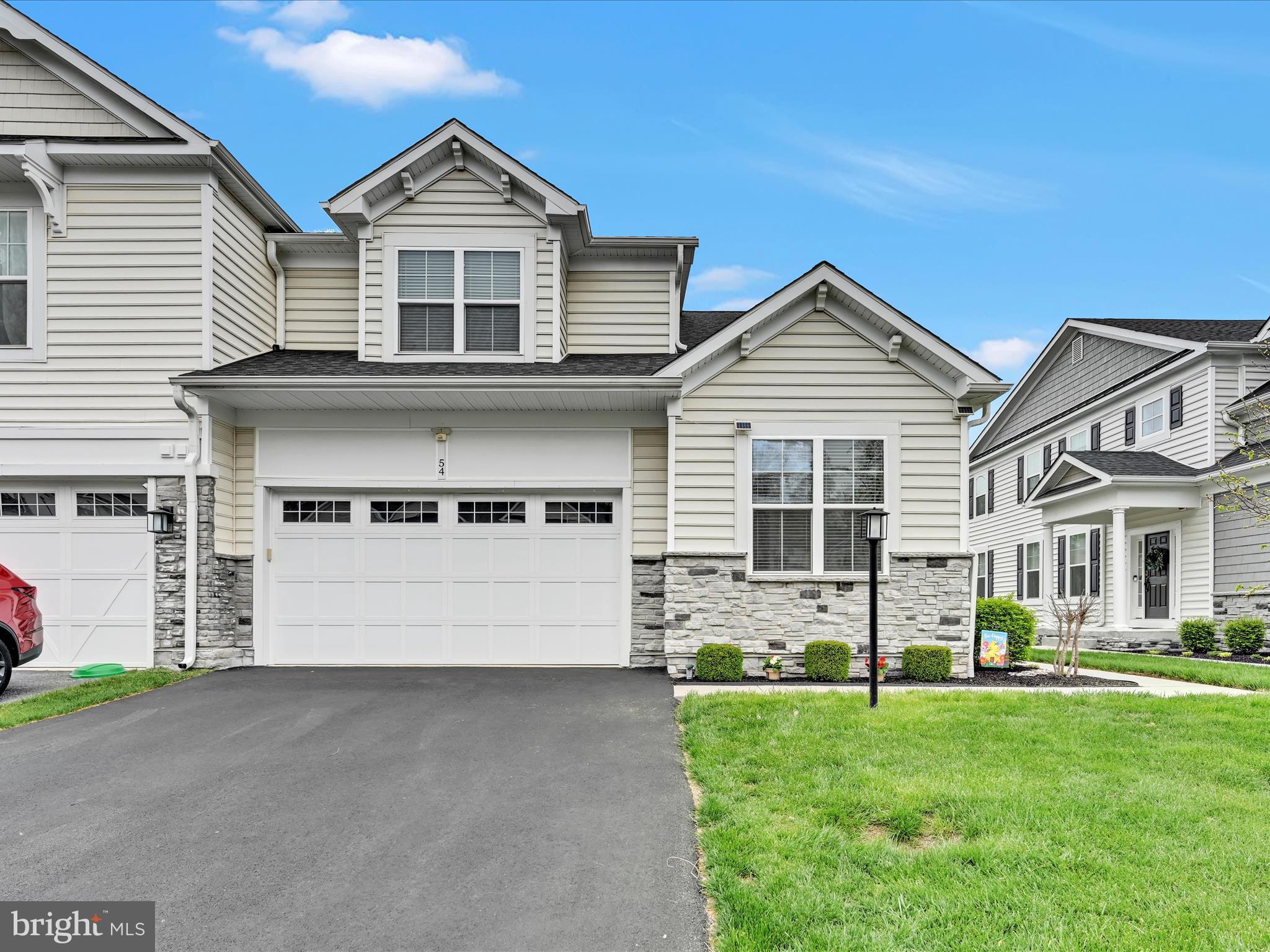 Welcome home to 54 Hunters Lane in the Brookfield Community of Glen Mills! This better-than-new end unit townhome with 4 bedrooms, 3 full and 2 half baths, and a 2-car attached garage has much to offer. Some of the special amenities include an open and bright floor plan, 9’ ceilings, hardwood flooring throughout, elevated trim package, upgraded lighting, appliances, fireplace details, flooring and utilities, 1st floor bedroom or office, and a full finished walk-out basement to a patio at grade. All overlooking a wooded open space and spectacular sunsets! Located in the Garnett Valley School District and just minutes from parks, the Wawa train station, and local shopping, this home also offers quick access to Route 1, Route 202, I-476, I-95, Philadelphia Airport, West Chester, Wilmington, and King of Prussia.