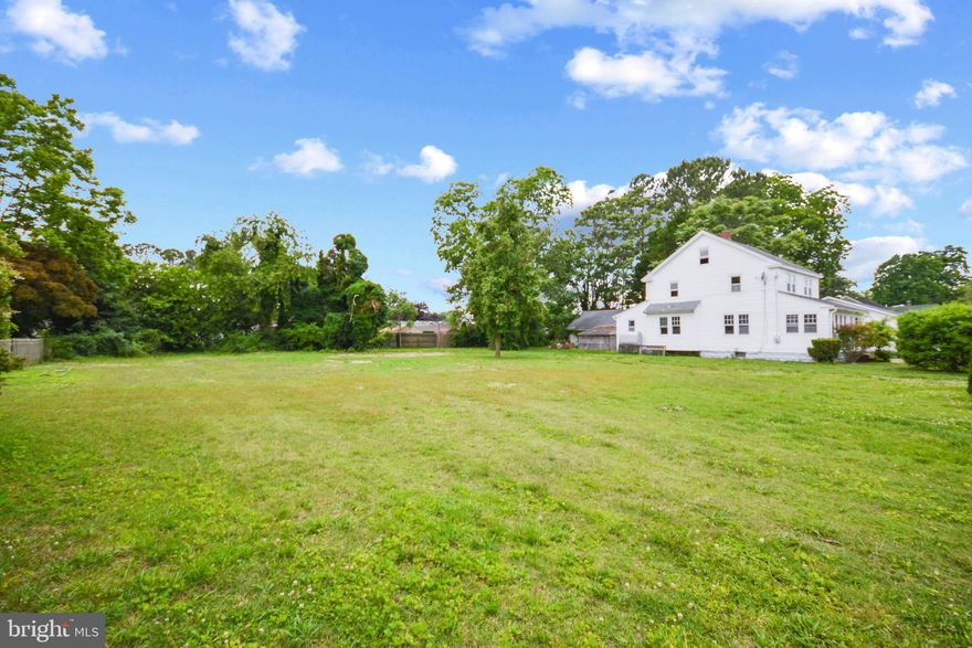 Introducing a charming, refreshed 1940s home nestled in Pocomoke City, MD.  This traditional home sits on a double lot which significantly enhances the appeal and potential of this property. The additional space grants you the freedom to create your own outdoor oasis, whether you dream of establishing a flourishing garden, constructing an outdoor play area, or simply enjoying the extra privacy and breathing room.   The layout boasts a traditional design, featuring distinct rooms that lend themselves to a variety of purposes. The living room provides an ideal space for relaxation and entertainment, while the separate dining room is perfect for hosting memorable gatherings. The kitchen, although modest in design, offers ample opportunity for customization and modernization to suit your personal taste.  The home has been freshly painted inside and out and features hardwood floors throughout the interior.  The upstairs offers 3 bedrooms and full bathroom.  On the 3rd floor you will find a partially finished stand up attic perfect for storage or potential for a flex room moving forward.  The property also features a large outbuilding that would be perfect as a workshop.  This great home allows you to move right in while also allowing you the freedom to put your personal touches on it.  Don't miss your chance to see everything this great property has to offer!