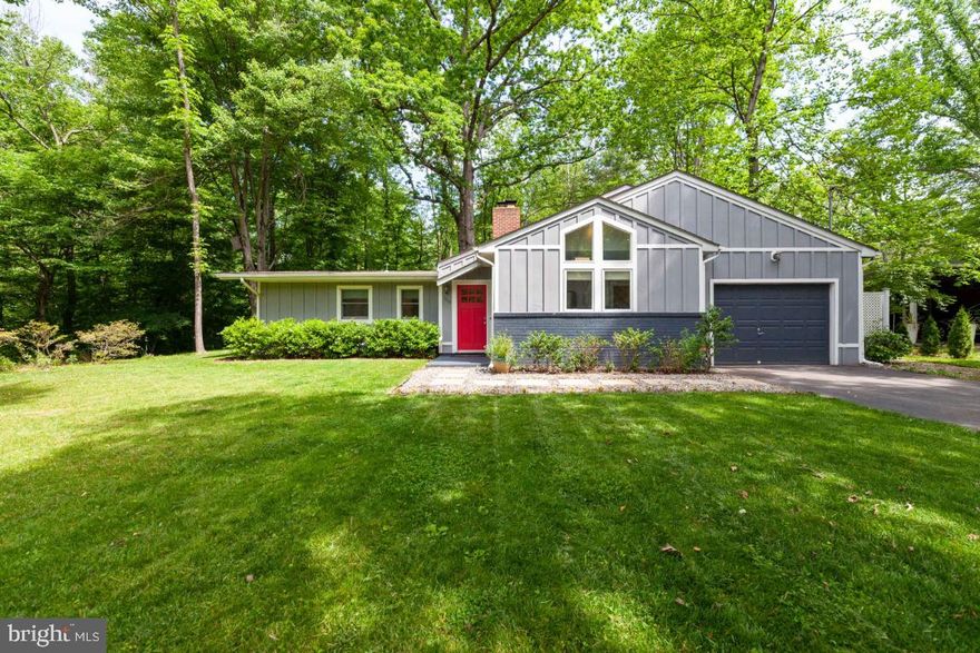 Remarkable renovated home backing to parkland and Holms Run Creek-approx 1/2 acre lot. Stunning views of parkland and trees.  Expansive back deck.  5 Bed. 2 full bath.  1 car garage.   Large Master Bed w/ walk out to deck and views of nature.  High end renovated master bath w. quartz counters.  Kitchen w/ granite counters and stainless steel appliances.  Porcelain tiled floors.   Family room w/ expansive views and gas fireplace.   This is a listing not to miss.   Over 2100 fin. sq. ft.  Bus to metro out front door.