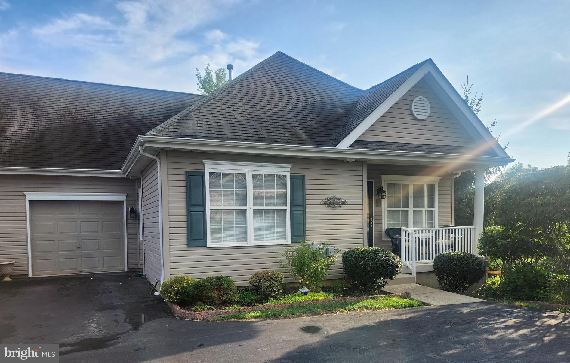 LOCATION! LOCATION! LOCATION! If you want privacy and a park like setting with the convenience of a 55+ then this is the place for you. Rarely offered twin with basement walk out is a prime location in desirable Chancellor Glen. View the sunset each evening off the front porch or see the pond from the back patio and surrounding nature. This home is the perfect location. Skylights in Living room and basement comes complete with a powder room. Main bathroom of the main bedroom is handicap accessible. Don't miss out on this one!