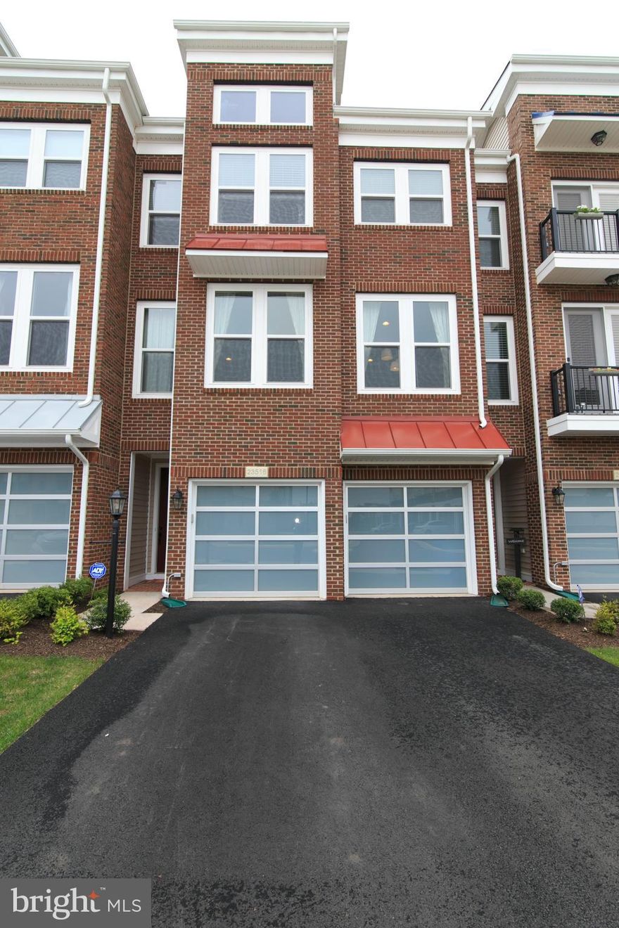 Gorgeous 3 bed, 4 bath townhome with contemporary open floor plan. Hardwood throughout the main floor. Amazing kitchen with granite counter tops, stainless steel appliances, large island, with seating for 4-5.  Deck and patio with fenced yard.  Close distance to neighborhood pool and to Brambleton Town Center.  Lawn Maintenance included.  Don't miss out on this gem! Pets case by case.