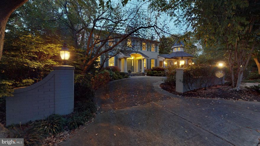 Quiet streets in established Country Club Hills with well kept homes is home to 4515 North 32nd Road. The impressive four pillar entrance welcomes you via a stone circular drive.  This 5 bedroom 4.5 bathroom Colonial has been tastefully expanded and refurbished creating a floor plan that is perfect for both formal entertaining and relaxed daily living. If you like to cook, the kitchen is a proven winner! The family room  is a cozy spot and the adjacent sun room provides a "hilltop" view of the neighborhood. The formal dining room and living room flank the 2-story main entry foyer. Tucked in a quiet corner of the main floor you will find the home office/library.  On the upper level is the primary suite plus 2 additional bedrooms and one bath and one of two laundry rooms. The home has 3 fireplaces both wood burning and gas fired.  The lower level has many uses! It can be a  perfect in-law/au-pair suite on a "walk -out" level  with outside access to a private porch/patio. Garage is accessed on this level as well.  There are 2 bedrooms,  a full bath, a large game room with wet bar and a large sitting room  plus a second  "kitchen" and a 2nd  laundry. One of the best features is the Gazebo/screened porch located just off the kitchen. With the extensive landscaping and hard scape, relaxing on the screen porch or dining al fesco on the slate tiered patios with a permanent gas  grill  and fire pit is absolutely peaceful and private.  This is a one of a kind home showing quality through out and one to come see. Square footage is  over 4000 square feet of conditioned  living space.