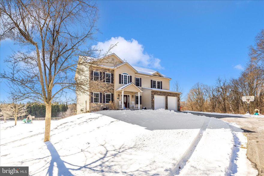 Welcome to 19529 Portsmouth Dr in beautiful Foxleigh Meadows.  This lovely home sits on a 2.9-acre lot providing a lot of privacy and room to do just about whatever you'd like.  The main level features a living room, dining room, updated kitchen with stainless steel appliances and granite countertops, half bath, laundry room and a massive family room with gas fireplace.  Moving to the second story, the owner's suite is oversized with massive walk-in closet and en-suite bathroom.  There are three more large bedrooms and two more full bathrooms upstairs.  The basement is unfinished but could easily be converted to a second family space, in-law suite, or rec area.  There is a walkout door leading to a lower-level patio and a bathroom rough in should you want to finish the space.  The exterior of the home features a massive flat yard and an oversized composite deck.  Don't miss your chance to see this wonderful home.  It won't last long!!!