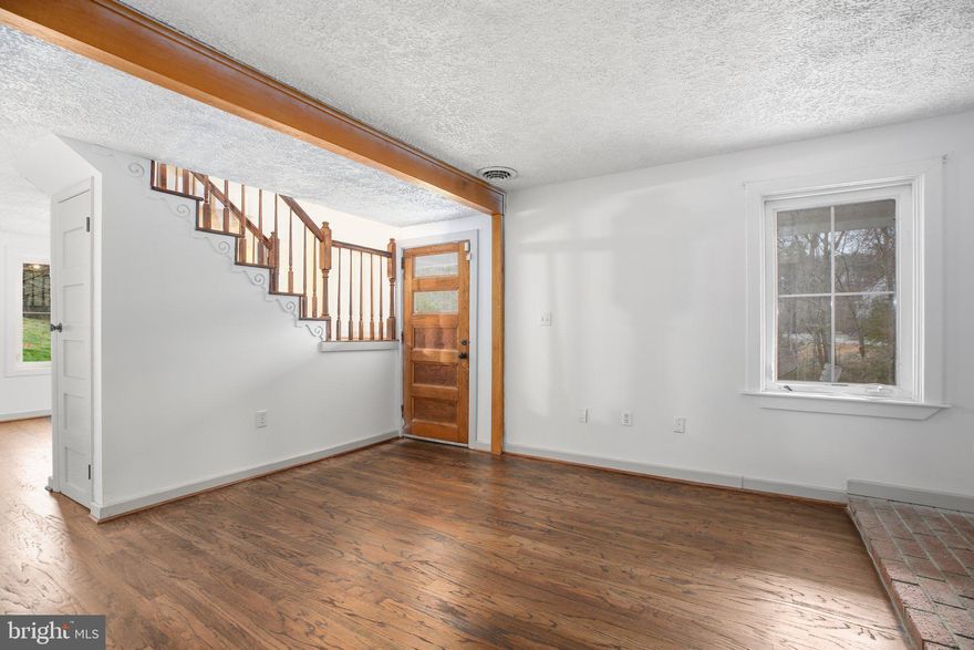 Welcome to 118 Bluebird Lane, a Stafford County original farmhouse that blends modern updates with antique charm. Set on 8 private acres and just minutes from I-95, this 2,000-square-foot home offers peace and convenience. **Modern Comfort Meets Rustic Elegance** The first floor includes a flexible family area with refinished hardwood flooring, a cozy dining room, and a wood stove that can heat the entire home. The kitchen boasts a beautiful brick floor, a farmhouse sink, and plenty of cabinetry. The hardwood staircase leads to the second story, which offers 4 bedrooms and 2 full baths. **Outdoor Amenities for Every Lifestyle** Enjoy private patio spaces and a deck off the master bedroom. Zoned for agricultural use, the property is perfect for a mini-farm or enjoying spacious outdoor areas, including a shed with electricity. **Prime Location** Located close to I-95, this property offers convenience without sacrificing privacy. Make this stunning farmhouse your home. Schedule a tour today and experience modern country living!