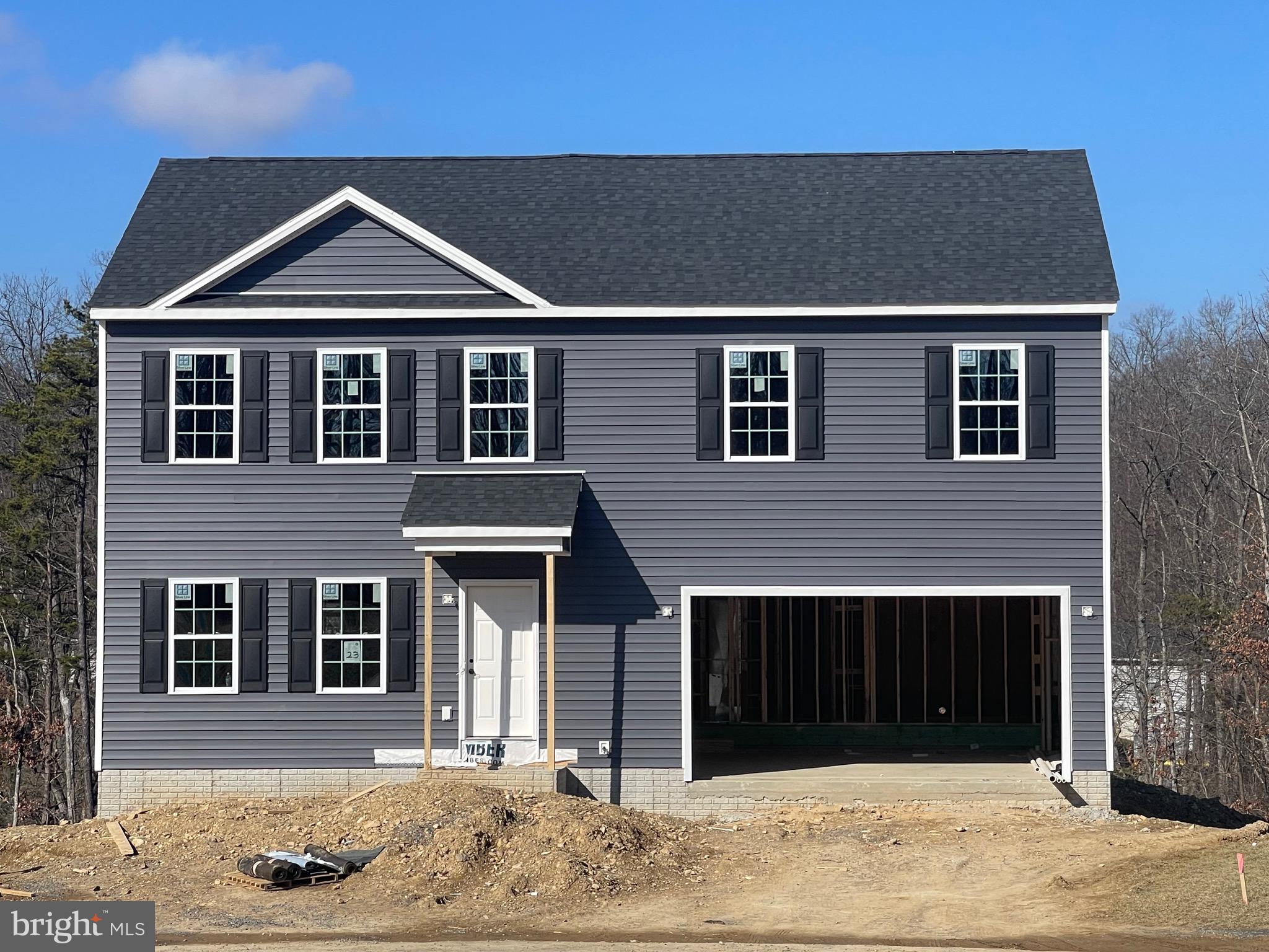Home is being framed up, buyers can still choose color selections! This home comes with a fully finished basement!
BUILDER WILL PAY $ 5,000 Towards Closing Cost.
Charming Two-Story Colonial Home Offering 2784 sq ft of living area.Four bedrooms on second floor with two bathrooms. Half bath on first level. Finished rec room with 720 sq ft of living area with third bath.
Step into this splendid two-story Colonial residence, boasting a generous 2784 square feet of luxurious living area. On both floors, you'll be greeted by spacious 8-foot ceiling heights.
This home features four well-appointed bedrooms, providing ample space for rest and relaxation. With 2.5 meticulously designed baths, convenience is at your fingertips. The two-car garage ensures that your vehicles have a secure and convenient home of their own.
The generously sized primary bedroom is a sanctuary in itself, featuring a walk-in closet that will satisfy your storage needs and a roomy bathroom .
The heart of the home is the expansive family room, seamlessly integrated with an open kitchen and a spacious breakfast area. This layout is perfect for entertaining guests or enjoying quality time with loved ones.
A dedicated walk-in laundry area enhances the convenience of daily chores, making laundry a breeze. The kitchen is adorned with stainless steel appliances and topped with elegant granite surfaces, creating a chef's dream kitchen that combines style and functionality.
Fully finished basement with 720 sq ft and full bath.