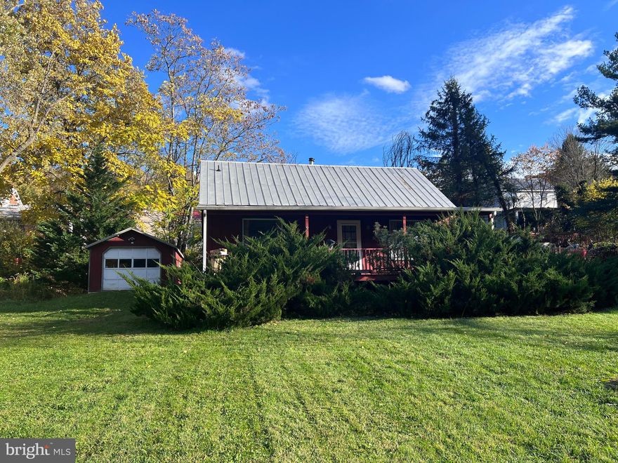 This Home Needs Some TLC  - Home features: 2 bedrooms (1 in loft), kitchen-dining room, living room, laundry/utility room, 1 full bath, covered front porch.   Heat pump/CAC, public water & sewer, .303 acre lot, plus a detached garage/shed for additional storage.   Come take a look at this gem!