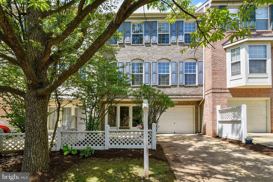 HUGE PRICE IMPROVEMENT! WALK TO VIENNA METRO! Big beautiful quiet brick luxury Townhome.  Main level w/ cozy 3-sided gas Fireplace, large eat-in Kitchen opens to fully fenced private brick patio, Dining Room & big bright Living Room.  Master Bedroom with private bath WI closets & two more big bedrooms.  Lower Level  has a 1-car garage & Rec Room/4th BR w/private bath.  HAVE IT ALL so don't wait!