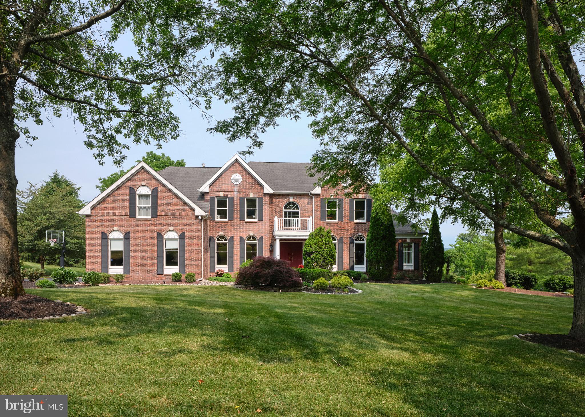 Nestled in the charming community of Jericho Valley, surrounded by picturesque rolling hills, sits this exquisite brick front colonial on over an acre of pristine land. The grand Madison model boasts a center hall colonial layout, complete with a stunning conservatory and a remarkable finished basement that includes a bedroom, theater, bar, luxurious bathroom with a shower, sauna, gym, and convenient outside access to the inviting pool area. Perfect for entertaining or simply unwinding, the outdoor space features a spacious Trex deck with an automated awning, a heated pool and spa, and meticulously landscaped grounds with incredible perennials that ensure privacy and tranquility. The first floor showcases a living room, family room with soaring stone fireplace, graciously sized dining room, home-office, and a versatile conservatory with TONS of windows. The well-appointed kitchen boasts a Wolf steam convection oven, spacious kitchen island, tons of counter space and so much more. The second floor reveals a spacious master bedroom suite with a cozy sitting area and an expansive walk-in closet, along with three additional bedrooms and three fully updated baths. Notable features include a tank-less water heater, electronic remote garage door opener, attic fan, whole house GENERATOR, and even a HEATED FLOOR in the ping pong table room. Wrightstown Township, located in the heart of Bucks County, offers a peaceful suburban setting while providing convenient access to nearby towns, major highways, and airports. Situated just a short drive away from historic Newtown and New Hope, residents of Wrightstown Township can enjoy a variety of charming shops, restaurants, and cultural attractions. With its close proximity to Interstate 95 and the Pennsylvania Turnpike, commuting to neighboring cities like Philadelphia and Princeton is a breeze. Additionally, the township's location near major airports such as Philadelphia International Airport and Trenton-Mercer Airport makes traveling domestically and internationally convenient for both business and leisure. Whether it's exploring the local community or venturing out to nearby destinations, Wrightstown Township offers a desirable location with easy access to everything you need and HIGHLY rated school district! HVAC units replaced in 2020 and June 2023!!