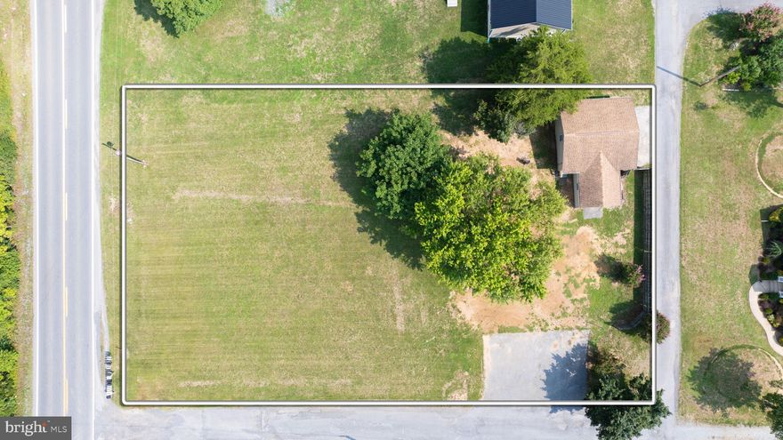 Mobile home used to reside on property up until 2 months ago. Public water and sewer. Electric already ran on property. Building is in great shape and has new windows and doors put in. This .57 acre lot has loads of possibilities: Commercial space, car lot, investment or ready for a home to be put on.