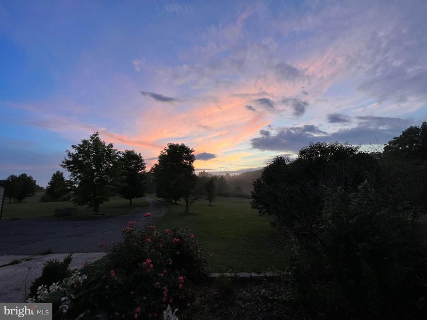 Almost an acre lot in Sleepy Knolls w/ community water already onsite ! Paved roads, underground utilities and priced to sell at $10,000 ! Developers original cost was $32,000 each and owner-financing is available to qualified buyers! Grab your piece of " Almost Heaven " today !