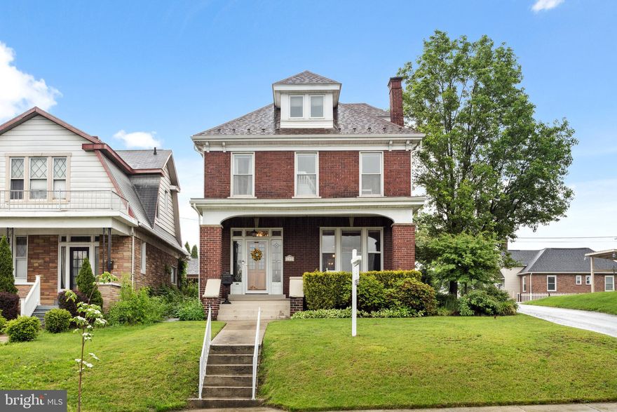 Welcome to this stunning all-brick traditional home perched on a beautifully landscaped corner lot with seasonal views overlooking the city. This 4-bedroom, 2 full-bath residence is filled with timeless charm and thoughtful updates, featuring gleaming hardwood floors, intricate original wood trim, brand-new carpet, and fresh paint throughout most of the home. The renovated kitchen shines with stainless steel appliances and quartz countertops, while the inviting full front porch and relaxing rear deck provide ideal spaces to unwind. Additional highlights include a carport, newer roof and gutters, and a walk-up attic offering extra storage or potential for expansion. Lovingly maintained and full of character, this home offers the perfect blend of classic detail and modern comfort. The convenient location offers easy access to schools, churches, restaurants, shopping, UPMC hospital, and I-68. Outdoor enthusiasts will love being just minutes from the C&O Canal and the Highland Trail—perfect for cycling, running, walking, or a casual stroll.