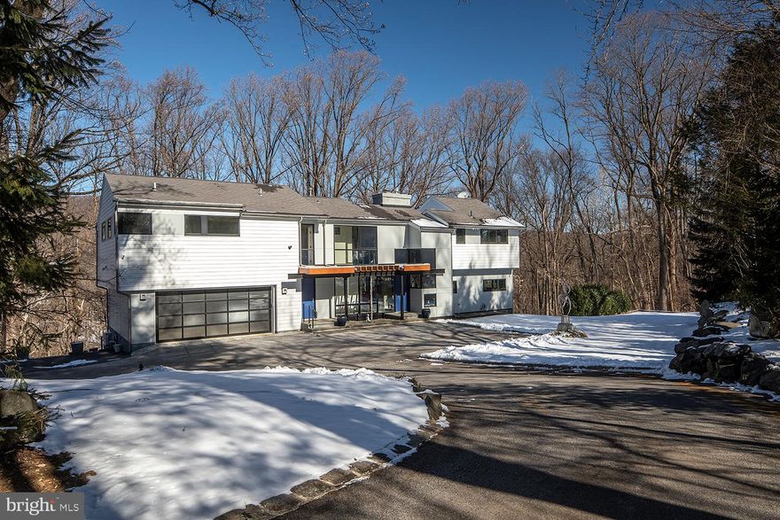 Tucked away at the end of a quiet cul-de-sac on a private 2.4-acre wooded lot sits this gorgeous, fully remodeled, contemporary home.
 
The first floor is open and inviting with modern features and incredible flow. Enjoy time with friends & family in the oversized family/dining and kitchen area, with stunning windows and skylights that frame the seasons & fill the space with natural light. The family room has a gas fireplace and access to the incredible rear deck that overlooks the Valley Stream, which bisects the property, and Valley Forge Mountain in the distance. Nearby the open kitchen is equipped with state-of-the-art, stainless steel appliances, new countertops, a breakfast bar & a large pantry. Also on this floor is a cozy home office/den with amazing views of the wooded grounds.
 
Upstairs there are 3 spacious bedrooms and 3 recently remodeled full baths. This includes an incredible suite with a private bath, sitting room, cathedral ceiling, private deck, fireplace, walk-in closet, and separate access, which could be suitable for a luxurious owner or in-law suite.

The finished lower level has plenty more to love with a gym or 4th bedroom, full bath, playroom and wine cellar with natural wood accents. There is also an oversized family room with a walkout to the gorgeous outdoor space where the new buyers can cook s'mores in the fire pit, sit on the rear deck and relax with a glass or wine or walk the trails.  

With the Cool Valley Nature Preserve right in your backyard and Valley Creek Preserve nearby, 2301 Pheasant Hill Lane allows you to enjoy the peace and tranquility of being surrounded by nature while at the same time a great family home and perfect for entertaining. The house is not in a flood zone. All this conveniently located and in the award-winning Tredyffrin-Easttown School District.
